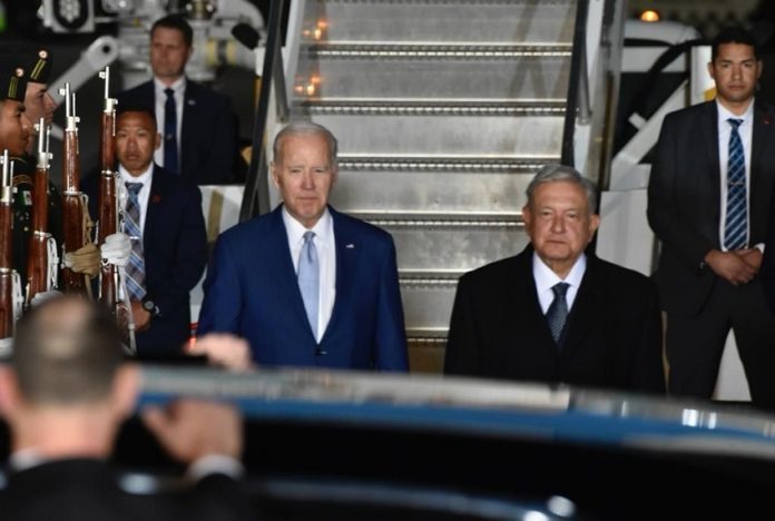 Joe Biden and AMLO stand in front of a car at Felipe Ángeles airport in January 2023.