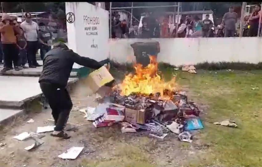 New textbook backlash continues with protests, e-book burning