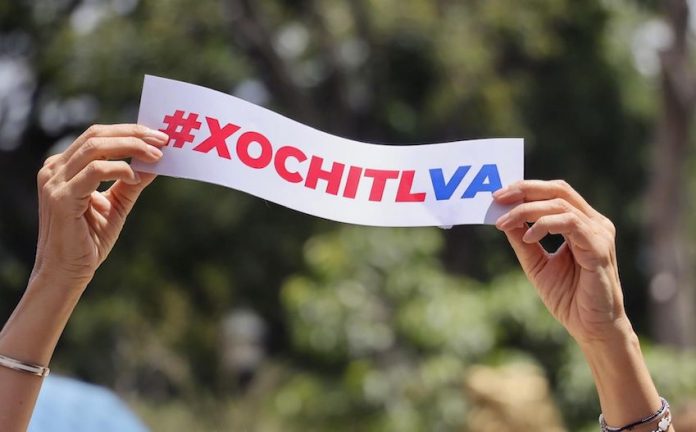 A XochitlVa placard