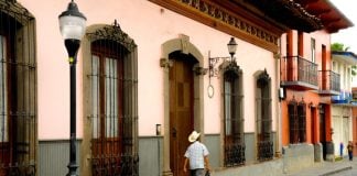 A man walking around in Coatepec's historic center in Veracruz, Mexico.
