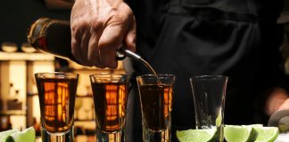 Bartender serving tequila