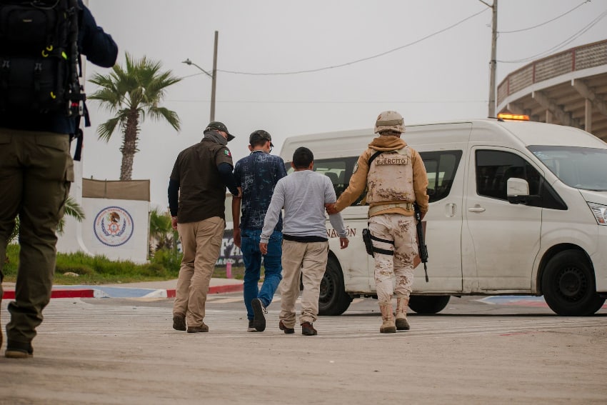 National Guard detain migrants