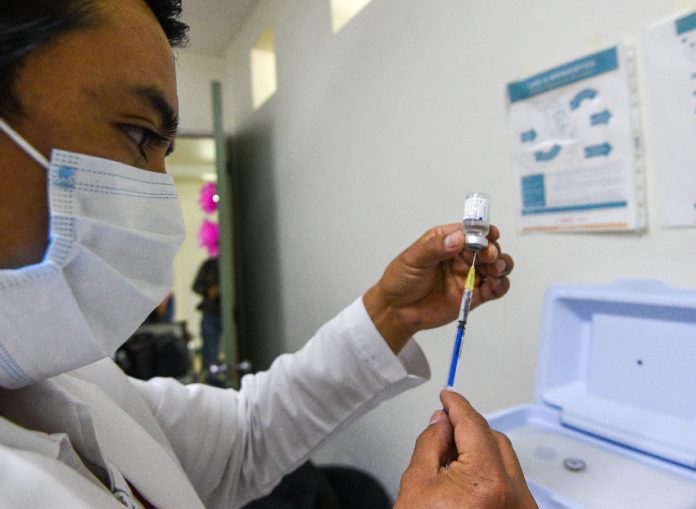 Doctor prepares a vaccine