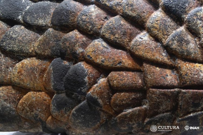 A close up shot of painted stone snake scales