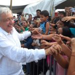 President López Obrador greets people