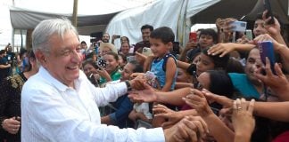 President López Obrador greets people