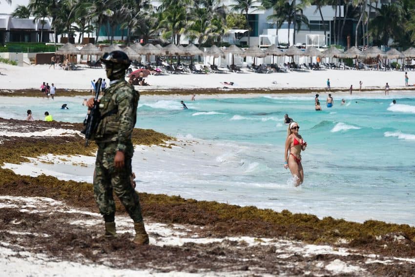 Soldier on a Cancún beach