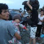 A group of migrants near the Río Bravo