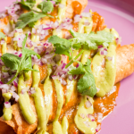 A photo of plated enchiladas