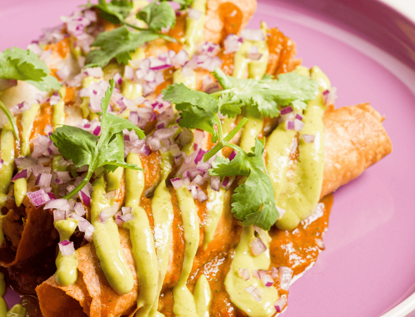 A photo of plated enchiladas