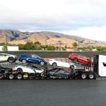 Tesla vehicles on a trailer