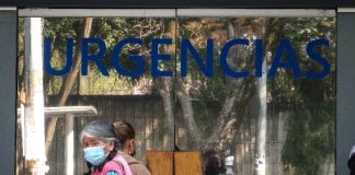 Woman with a mask outside of a hospital in Mexico City