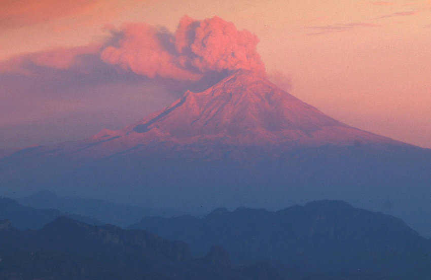 Sunset scene showing smoke rising from Popocatépetl