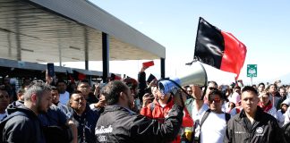 Workers protest outside of Audi plant in Puebla