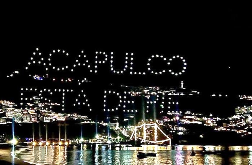The message "Acapulco is on its feet" in the sky