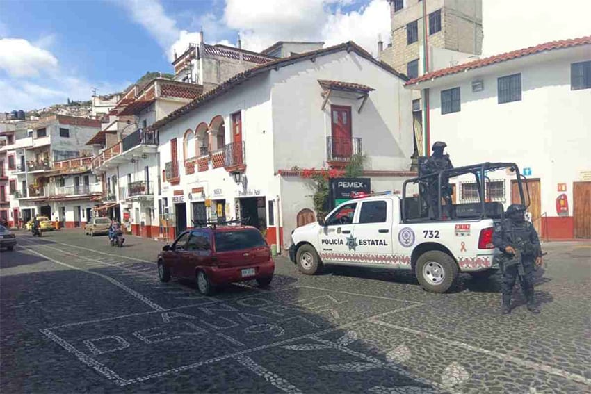 State police patrol the historic center of Taxco. 