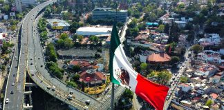 Mexican flag seen from above over Mexico City