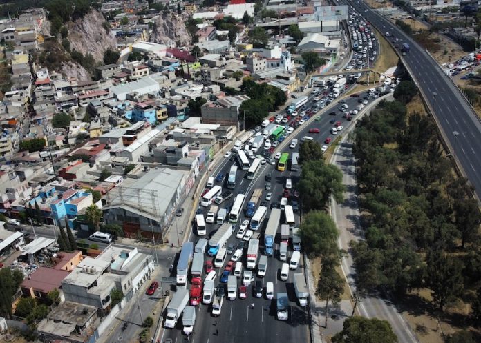 Truckers block a highway in Mexico City