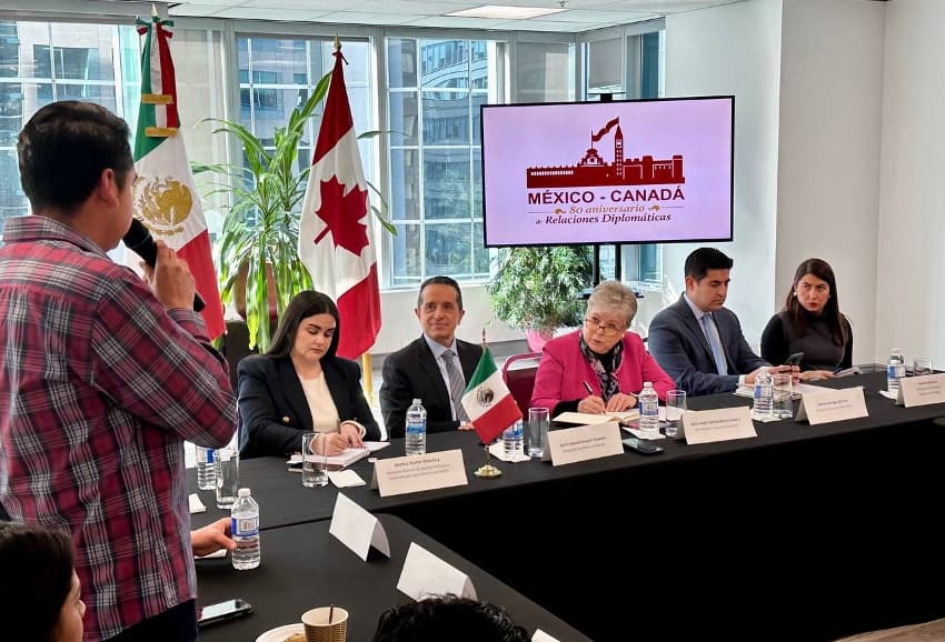 Mexican and Canadian officials at a meeting