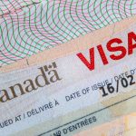 A closeup of a Canadian visa.