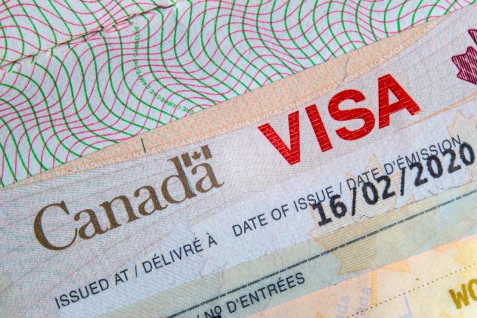 A closeup of a Canadian visa.