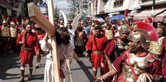 Jesus carries the cross, in a scene from the 2023 Iztapalapa Passion Play.