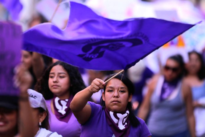 Woman at a march on International Women's Day in Querétaro