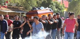 Students from the Ayotzinapa Normalist School march with a coffin in Chilpancingo, Guerrero