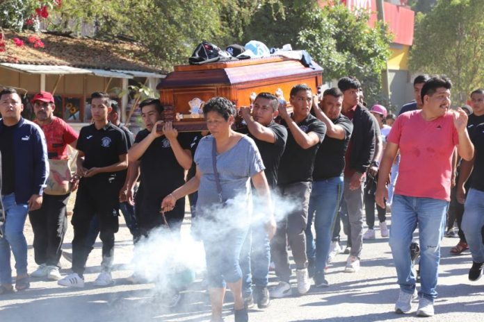 Students from the Ayotzinapa Normalist School march with a coffin in Chilpancingo, Guerrero