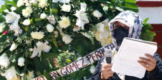 A memorial wreath for dead student Yanqui Kothan Gómez
