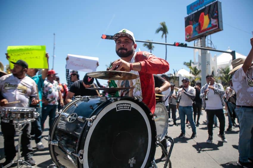 Banda musicians play along the malecón of Mazatlán, part of a protest against the uneven application of licensing regulations.