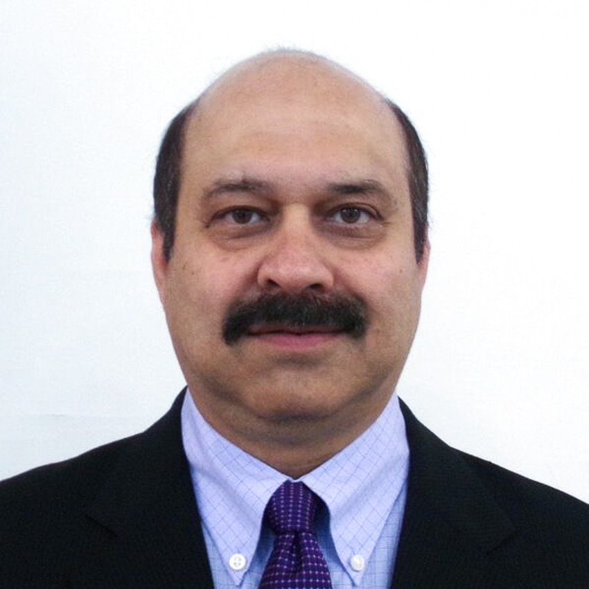 head shot of Vijay Malik, president of marketing and international sales at Hinduja Tech
