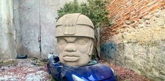 Olmec head vs Tesla car