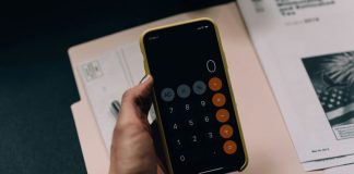 Tax return forms and a calculator