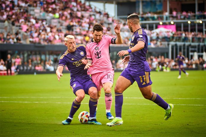 Messi faces two Orlando City players in a Round of 16 game for the Concacaf Champions Cup.