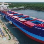 Container ship docked at the Sac Tun Marine Terminal owned by Vulcan Materials
