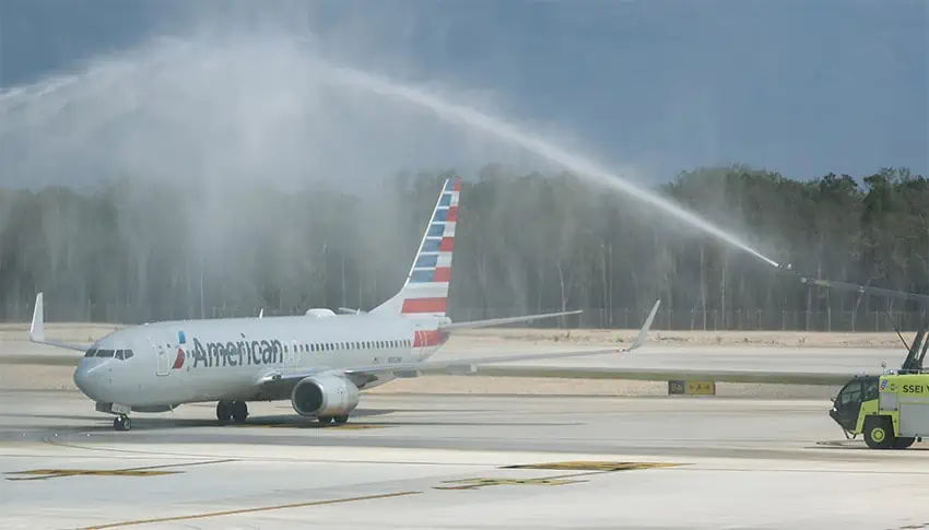 American Airlines flight 1131 from Dallas, the first international flight to land in Tulum, receives a water salute. 