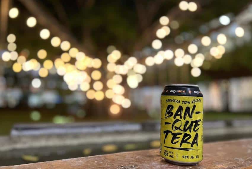 A photo of Buqui Bichi Brewing's Banquetera beer from inside one of the brewery's taprooms