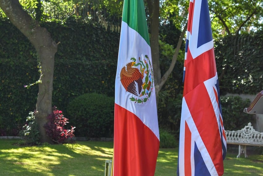 The flag of Mexico hangs next to the flag of the United Kingdom