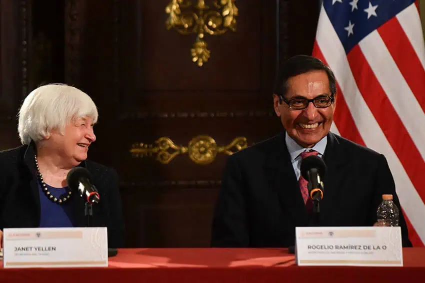 US Trade Secretary Janet Yellen sits at a conference table with Mexican Finance Minister Rogelio de la O