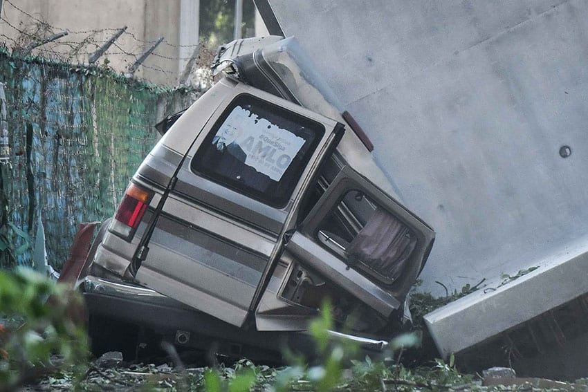 Van in Mexico City crushed by huge fallen concrete block