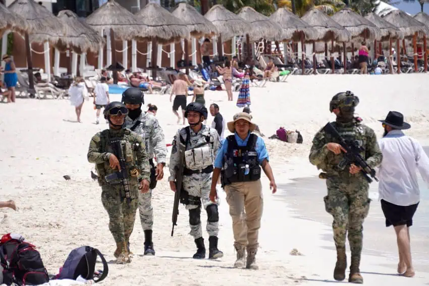 Marines and National Guard on a beach in Cancún