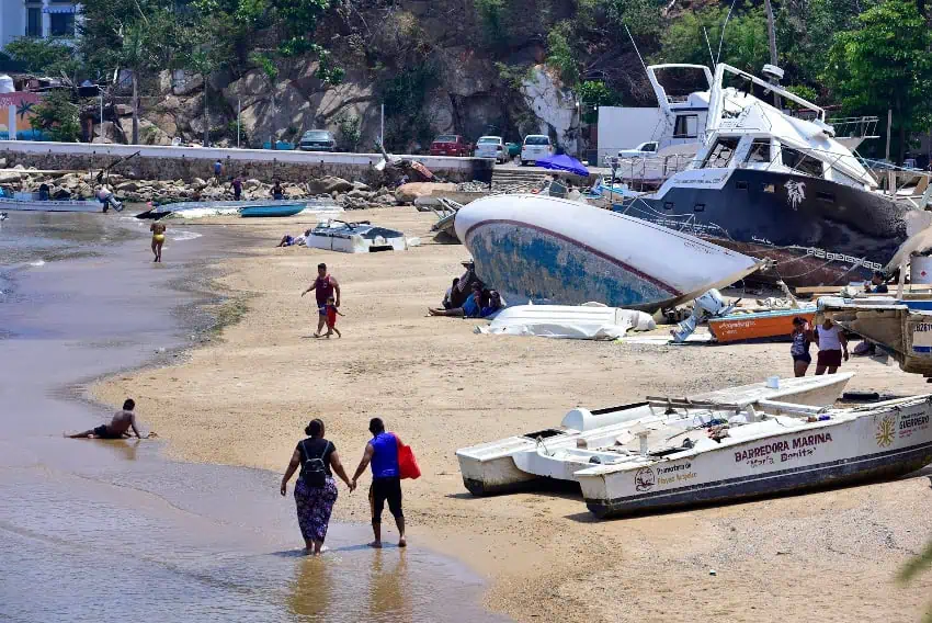 Acapulco beach with stranded boats