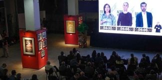 Media reporters watch a livestream of the second presidential debate at Estudios Churubusco in Mexico City, where the debate took place.