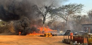 Construction materials on fire near a bridge in Chiapas