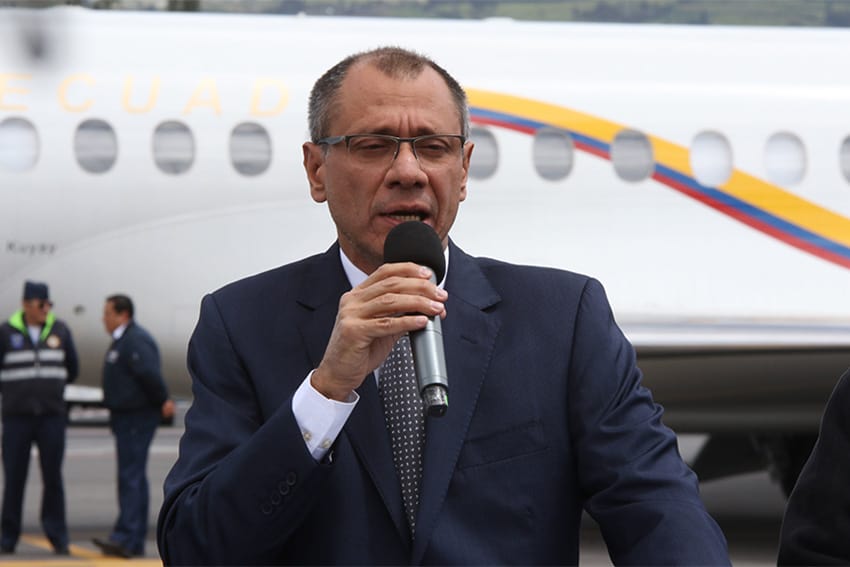 Former vice president of Ecuador Jorge Glas speaking into a microphone