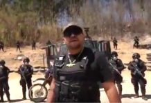 Narco corrido singer "El Oaxaco" in a music video screen capture