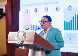 Mexico's scurity minister Rosa Icela Rodriguez speaking at a podium