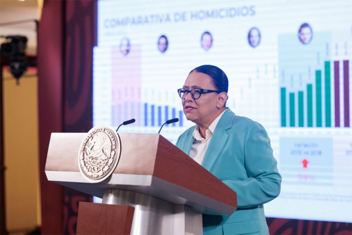 Mexico's scurity minister Rosa Icela Rodriguez speaking at a podium