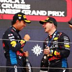 Checo Pérez celebrates with Red Bull teammate and race winner Max Verstappen in Japan